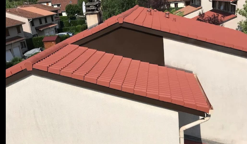 Remise à neuf d'une couverture et de ses rives — après travaux