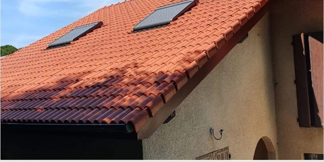 Rénovation d'une toiture avec fenêtres de toit — après travaux